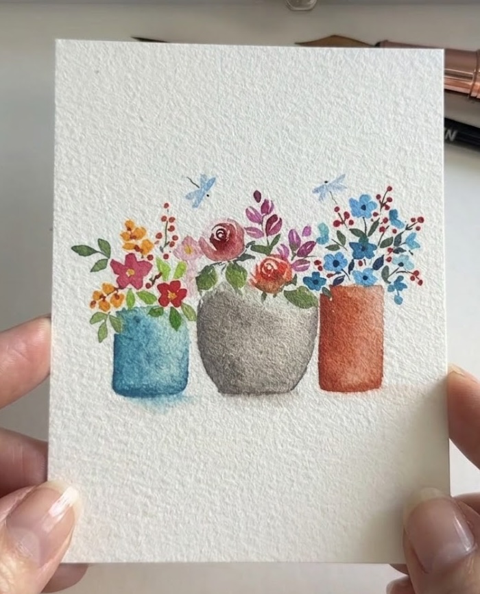 Small watercolor greeting card with three cottage flower pots
